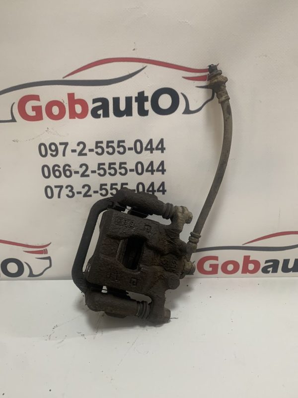 Б/У Суппорт задній лівий NISSAN QASHQAI J10  44011EM11A