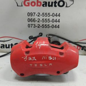 Б/У Супорт гальмівний задній лівий TESLA MODEL 3  1027643-01-B