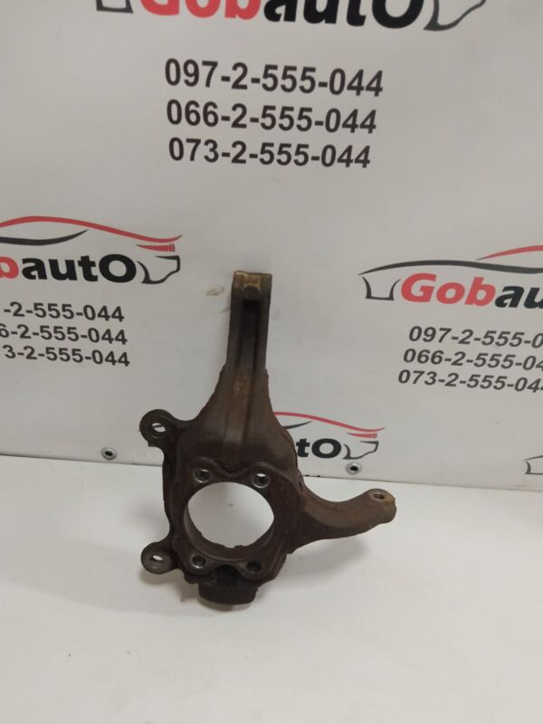 Б/У Цапфа (поворотний кулак) перед ліва NISSAN QASHQAI J10  40015JD000