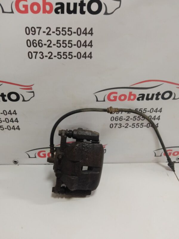 Б/У Суппорт передній лівий NISSAN QASHQAI J10  41011JD00A