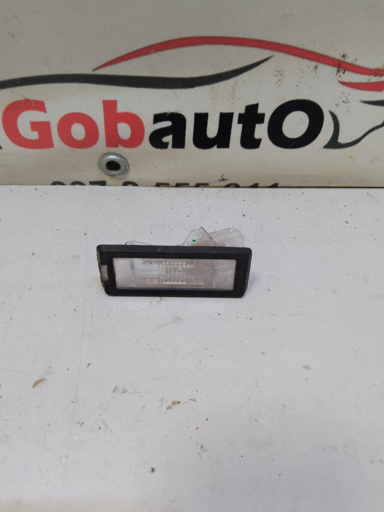 Б/У Ліхтар підсвітки номерного знаку RENAULT SCENIC III 8200013577G