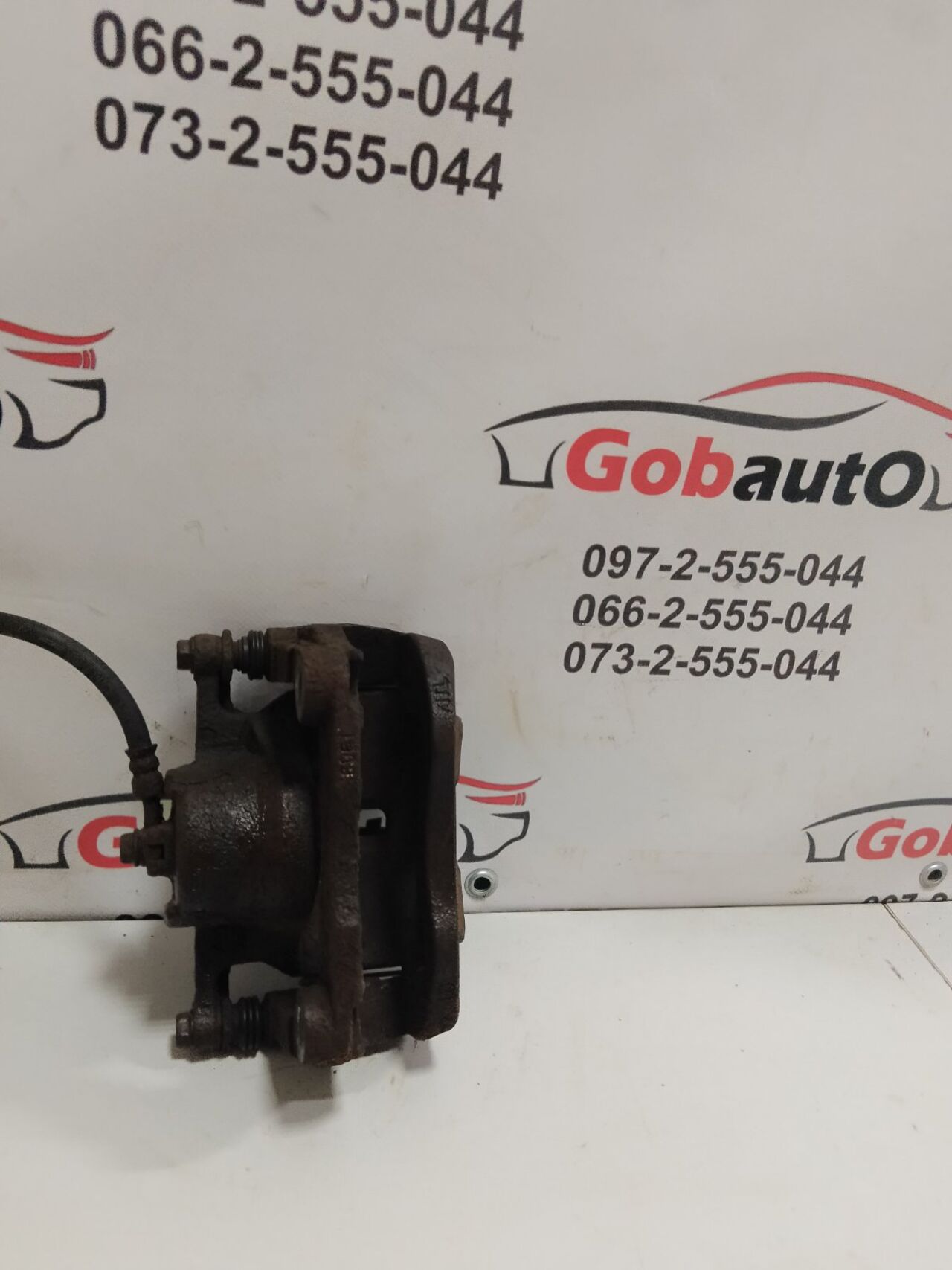 Б/У Суппорт передній правий NISSAN QASHQAI J10 41001JD00A