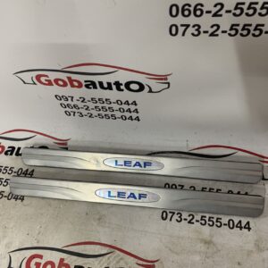 Б/У Накладка порога зовнішня передня ліва NISSAN LEAF 999G6-8X000