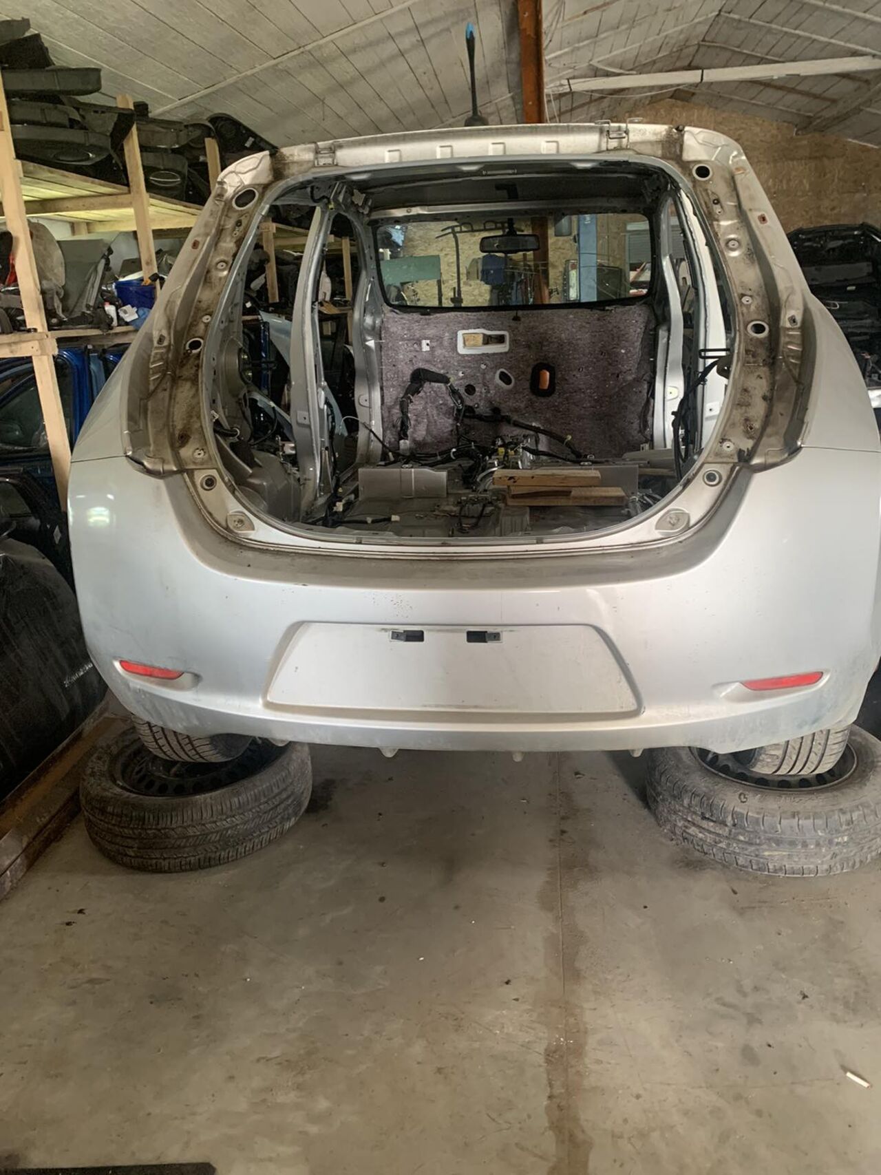 Б/У Бампер задній (колір K23) NISSAN LEAF 850223NF0H