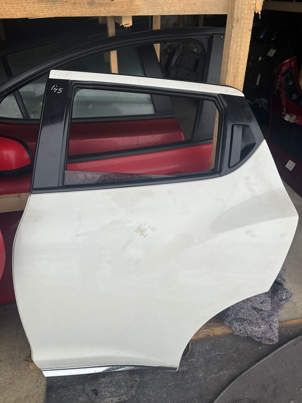 Б/У Двері задні праві гола (білий ) NISSAN JUKE TEKNA М145 H21001KKMA