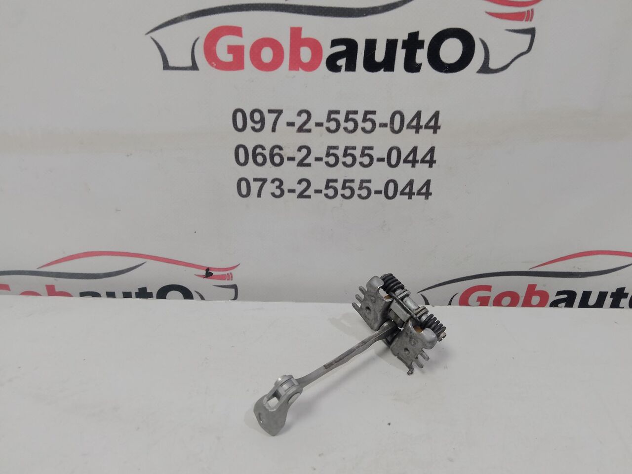 Б/У Обмежувач дверки задньої  RENAULT SCENIC III 824309533R